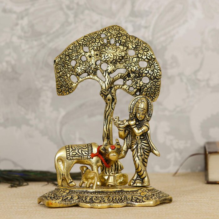 eCraftIndia Lord Krishna Playing Flute Under Tree with Golden Cow and Calf Showpiece - Image 1