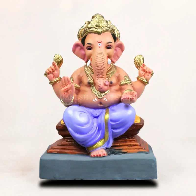 Eco-friendly clay Ganesh murti with orange and pink dhoti for Ganesh Chaturthi 2026 booking
