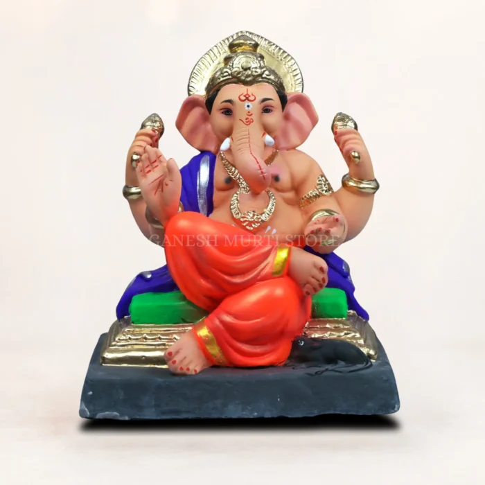COACH-N ORANGE DHOTI 12 INCH ECO FRIENDLY GANESH IDOL M 12 INCH ECO FRIENDLY CLAY GANESH MURTI WITH ORANGE DHOTI AT GANESH MURTI STORE