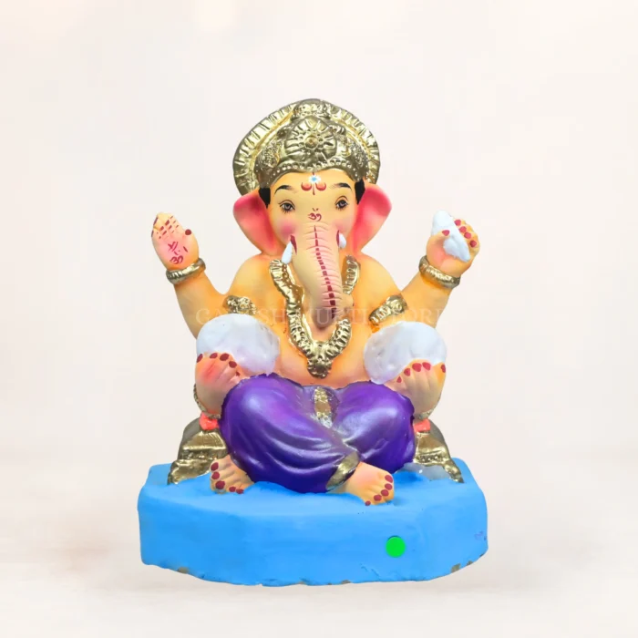 inch Eco-friendly Clay Ganesha Idol in Krishna avatar with pink cloth draping and flute, handmade