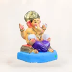 friendly Ganesha idol in Padmasana sitting pose made of natural Shadu Mati clay.