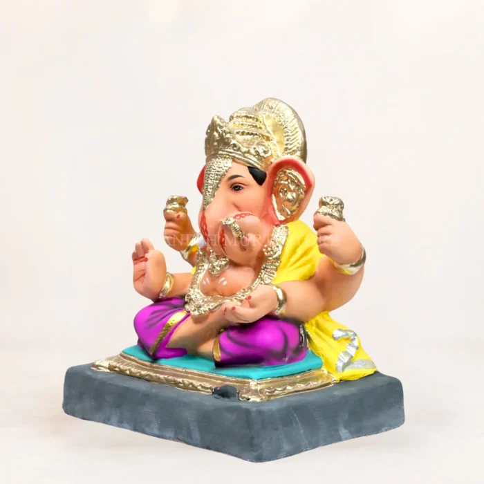 White Lal Bagh Raja Ganpati Murti made from biodegradable Shadu clay for Ganesh Chaturthi worship.