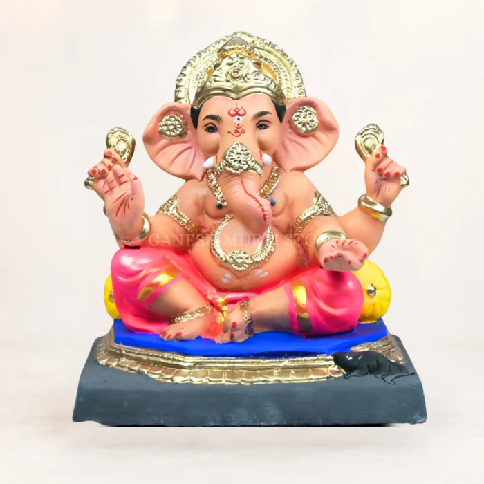 craftsmanship of Mahisuri Double Load Pink Dhoti clay Ganpati idol