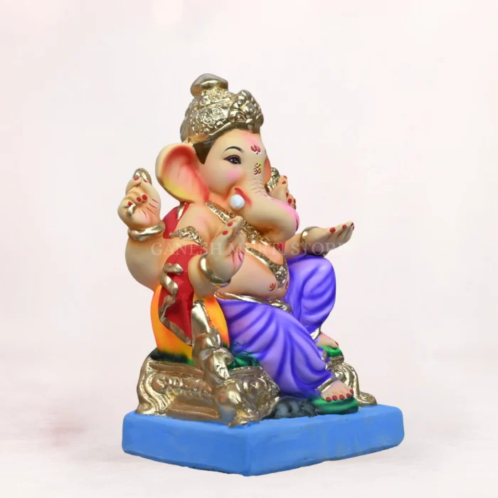 Side angle of Parbhal Load Blue Dhoti 14 Inch Eco-Friendly Ganpati Murti handcrafted from natural clay.