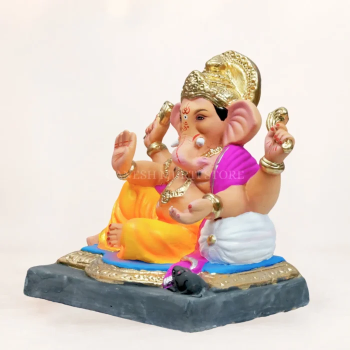 Buy clay ganesh idol online: 12 inch eco friendly Peshwa Ganpati murti in yellow dhoti by Ganesh Murti Store.