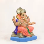 Close-up of Philips Light Orange Dhoti 15 Inch Eco Friendly Ganesh Idol with premium handcrafted details.