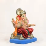 Close-up of Philips Orange Dhoti 15 Inch Eco Friendly Ganesh Idol with premium handcrafted detailing.