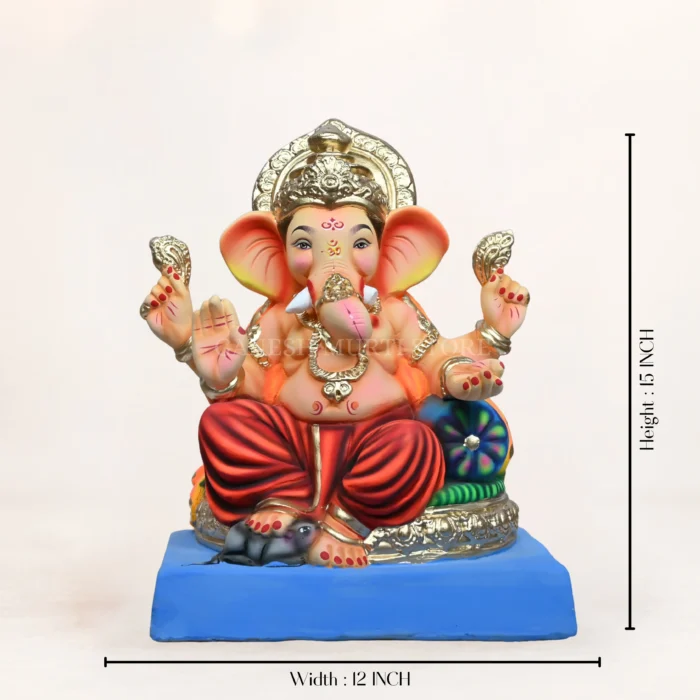 Eco-friendly clay Ganesh idol undergoing home immersion process in a bucket of water.
