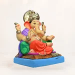 Front view of Shivrekar Double Load Orange 15 Inch Eco-Friendly Ganesh Idol made from biodegradable Shadu clay.