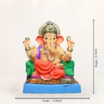 Side angle of Shivrekar Double Load Orange 15 Inch Eco-Friendly Ganpati Murti handcrafted from natural clay.