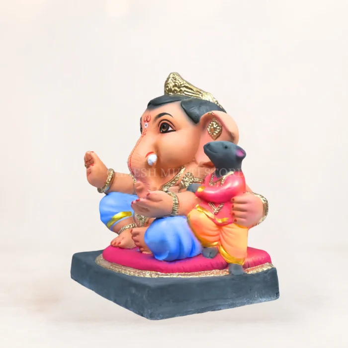 Hand-painted biodegradable Ganesh idol with vibrant eco-friendly colors.