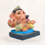 Eco-friendly Ganpati idol with plantable seed concept made from natural clay and sustainable materials.```