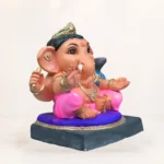 Biodegradable clay Ganesha idol with decorative crown, eco-friendly finish, and handcrafted design for Ganesh festival celebrations.