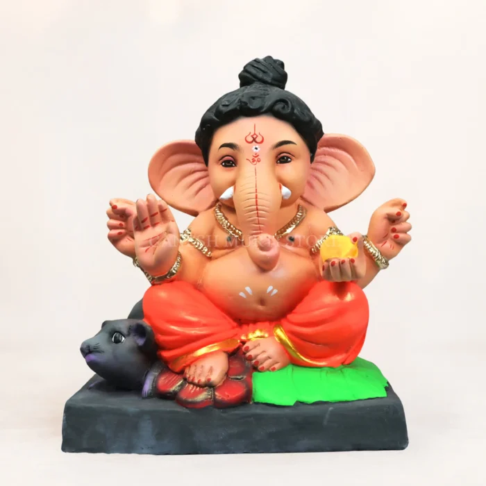 Premium artisan-made clay Ganesh idol eco-friendly handmade Ganpati murti for home puja and Ganesh festival decoration.