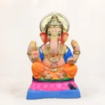 Side angle of Upra Kamal Yellow Dhoti 15 Inch Eco Friendly Ganpati Murti handcrafted from natural clay.