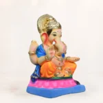 Front view of Upra Kamal Yellow Dhoti 15 Inch Eco Friendly Ganesh Idol made from biodegradable Shadu clay.
