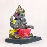 Side angle of Vithu Singhaasan Pink Dhoti 14 Inch Eco-Friendly Ganpati Murti handcrafted from natural clay.