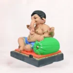Front view of 18 Inch Aasan Load Eco Friendly Ganpati Idol in Delhi with Royal Blue Dhoti and Shadu Mati Clay Detail