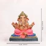 Zoomed-in close-up view highlighting the intricate ornaments and detailed facial features of the Gattu Aasan Pink Dhoti 20 Inch Eco Friendly Ganpati Idol.