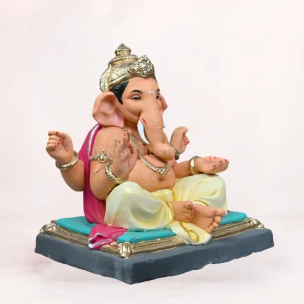 Front side profile view of handcrafted Gattu Aasan Yellow Dhoti 20 Inch Eco Friendly Ganpati Idol made from natural Shadu Mati clay.
