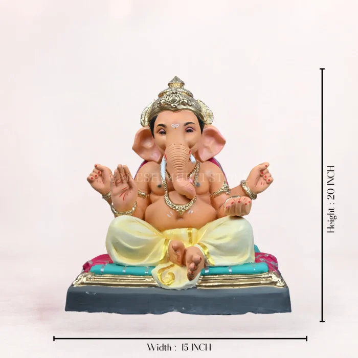 Zoomed-in close-up view highlighting the intricate ornaments and detailed facial features of the Gattu Aasan Yellow Dhoti 20 Inch Eco Friendly Ganpati Idol