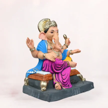 Koach Load Purple 18 Inch Eco-Friendly Clay Ganpati Idol sitting gracefully on a decorative purple bolster (load)