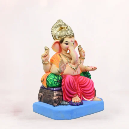 Side angle view of Maharaja Double Load Pink Dhoti 20 Inch Eco Friendly Ganpati Murti Idol showing one side of the decorative bolster