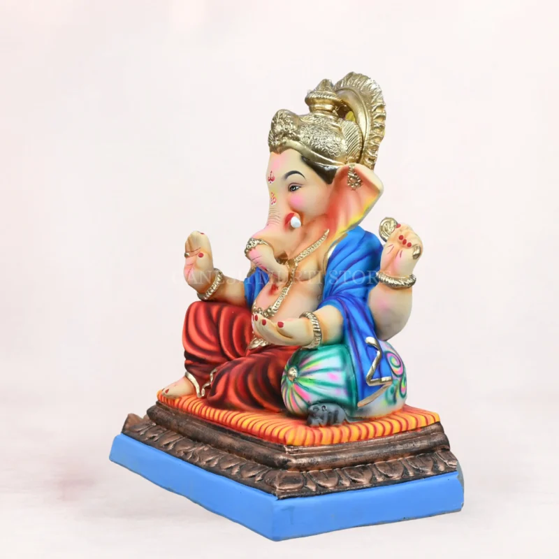 Side profile view of handcrafted Peshwai Load Red Dhoti 20 Inch Eco-Friendly Ganpati Idol made from natural Shadu Mati clay.