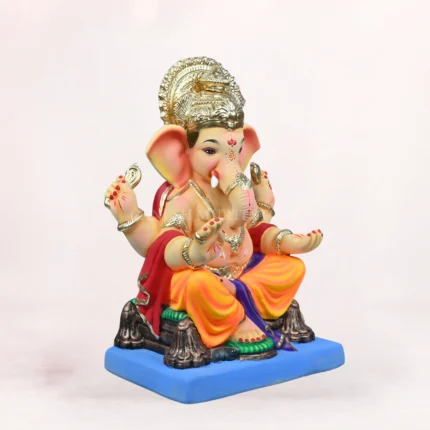 Front side profile view of handcrafted Philip Yellow Dhoti 20 inch Eco Friendly Ganpati Idol made from natural Shadu Mati clay.