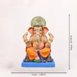 Zoomed-in close-up view highlighting the intricate ornaments and facial features of the Philip Yellow Dhoti 20 inch Eco Friendly Ganpati Idol.