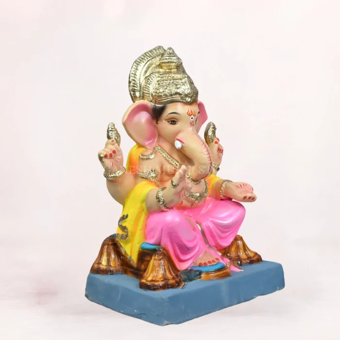 Front side profile view of handcrafted Philips Pink Dhoti 20 inch Eco Friendly Ganpati Idol made from natural Shadu Mati clay.