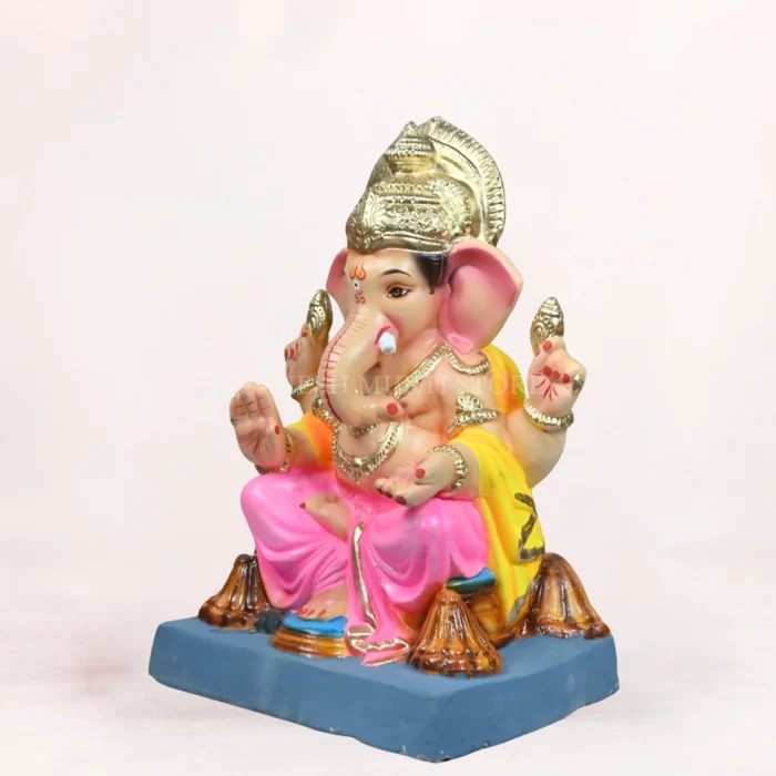 Front side angle view of handcrafted Philips Pink Dhoti 20 inch Eco Friendly Ganpati Idol made from natural Shadu Mati clay.