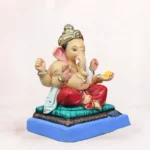 Front side profile view of handcrafted Philips Red Dhoti 20 Inch Eco Friendly Ganpati Idol made from natural Shadu Mati clay.
