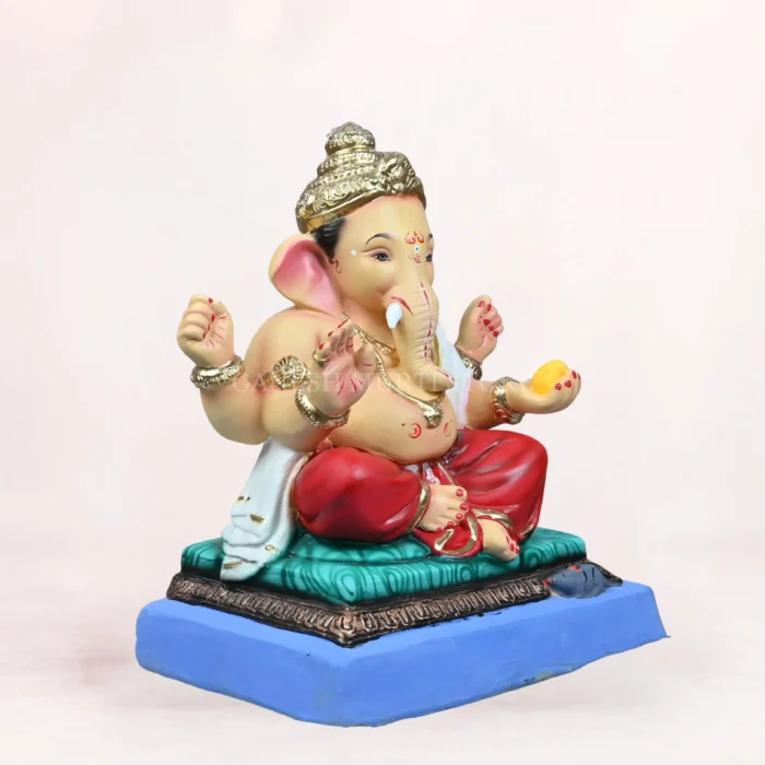 Front side profile view of handcrafted Philips Red Dhoti 20 Inch Eco Friendly Ganpati Idol made from natural Shadu Mati clay.