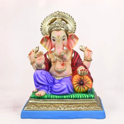 Peshwai Dhoti Light Purple Load 20 Inch Eco-Friendly Clay Ganpati Idol sitting gracefully on a decorative purple bolster (load)